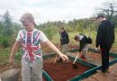 8 young Scouts from Byfield, UK help improve life conditions at the Kibera Scout Office
